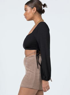   side view of model wearing Princess Polly Maisie Mini Skirt Brown 