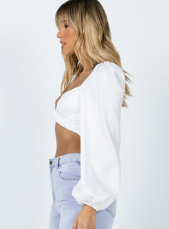side view of model wearing Princess Polly Carson Long Sleeve Top White Lower Impact Full Sleeves Sweetheart 