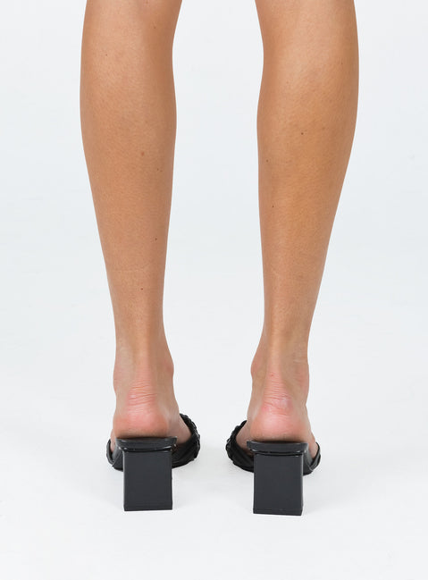 Black heels Faux leather material  Woven upper  Square toe  Shaved block heel  Padded footbed 