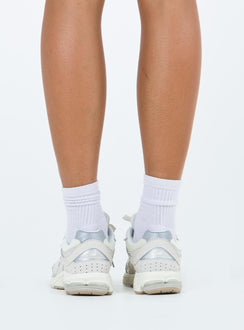 Sneakers  Faux suede and mesh material  Lace up style  Platform base Padded inner  Treaded sole 