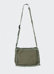 Crossbody bag Adjustable fixed crossbody strap Zip fastenings Two internal pockets Distressed detailing