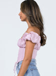 side view of model wearing Princess Polly Harry Top Pink 