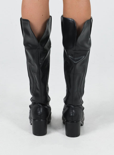 Knee high boots Faux leather material Stitched detail Pull tabs at side Pointed toe  Padded footbed