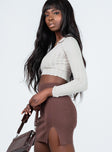   side view of model wearing Princess Polly The Lola Mini Skirt Coco 