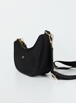 Crossbody bag Zip fastening Gold-toned hardware Two internal pockets Flat base