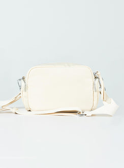 Crossbody bag Nylon material Silver-toned hardware Zip fastening Front & side pocket detailing Adjustable & removable crossbody strap Inner pocket zip fastening Flat base with feet studs