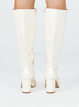 Cream knee high boots Faux glossy leather  Zip fastening at side  Block heel  Rounded toe 