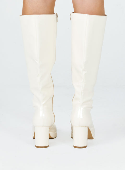 Cream knee high boots Faux glossy leather  Zip fastening at side  Block heel  Rounded toe 
