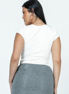 back view of model wearing Princess Polly Talbot Bodysuit Short Sleeves Crew Neck 