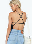 back view of model wearing Princess Polly Faithe Bodysuit Black Sleeveless High Neck 