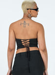 Black corset Pinstripe print Zip fastening at front Boning at bust Twin faux pockets Lace-up fastening at back