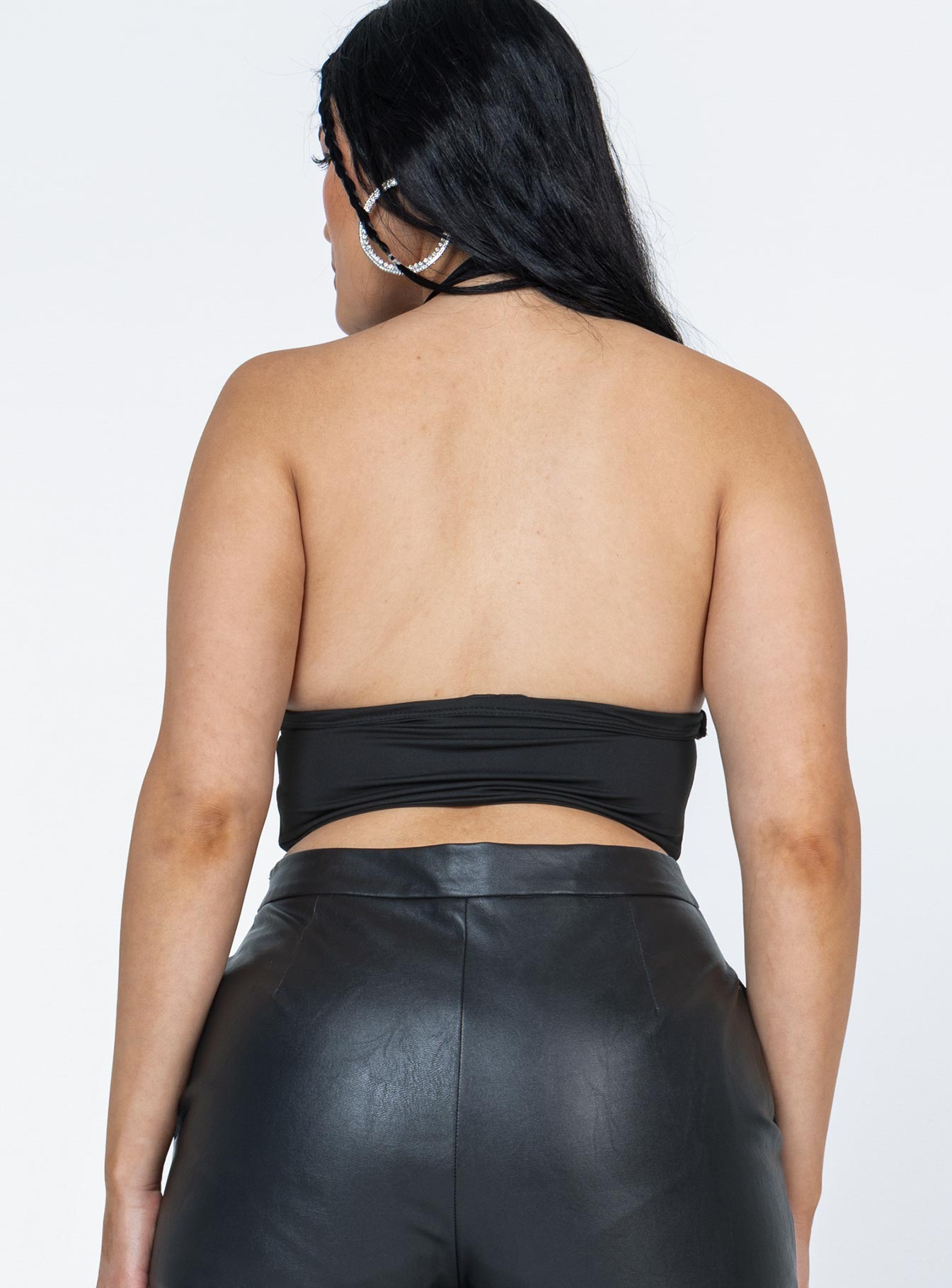 back view of model wearing Princess Polly Duke Top Black Sleeveless Plunger 