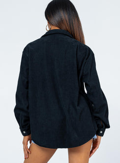 Oversized tshirt Cord material Button front fastening Scooped hem Single chest pocket