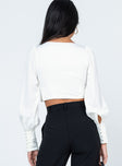 back view of model wearing Princess Polly Dimitri Long Sleeve Top White 