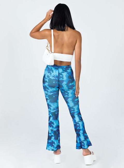 back view of model wearing Princess Polly Allen Floral Flare Pants Blue 