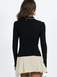 Black long sleeve top Ribbed material Mock neck Good stretch