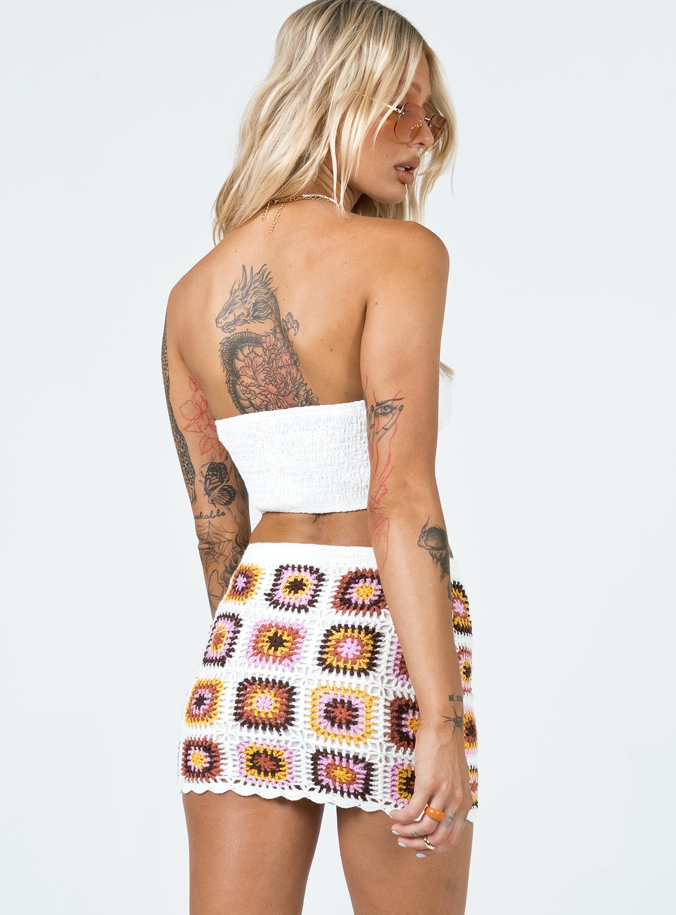 back view of model wearing Princess Polly Barbados Crotchet Mini Skirt Multi 