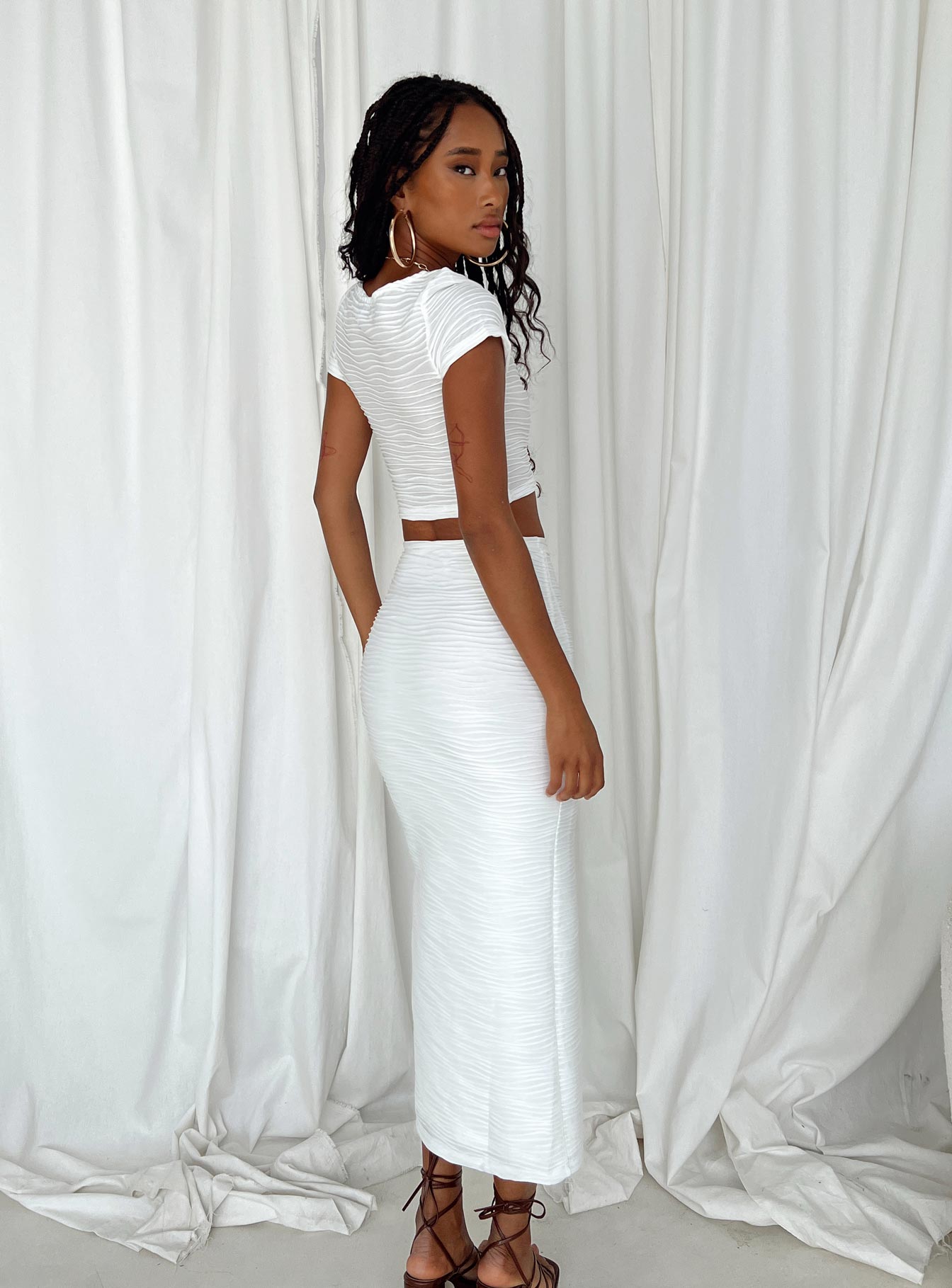 Matching set Textured material Crop top Maxi skirt Slit at side