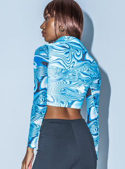 side view of model wearing Princess Polly Alina Long Sleeve Top Blue 