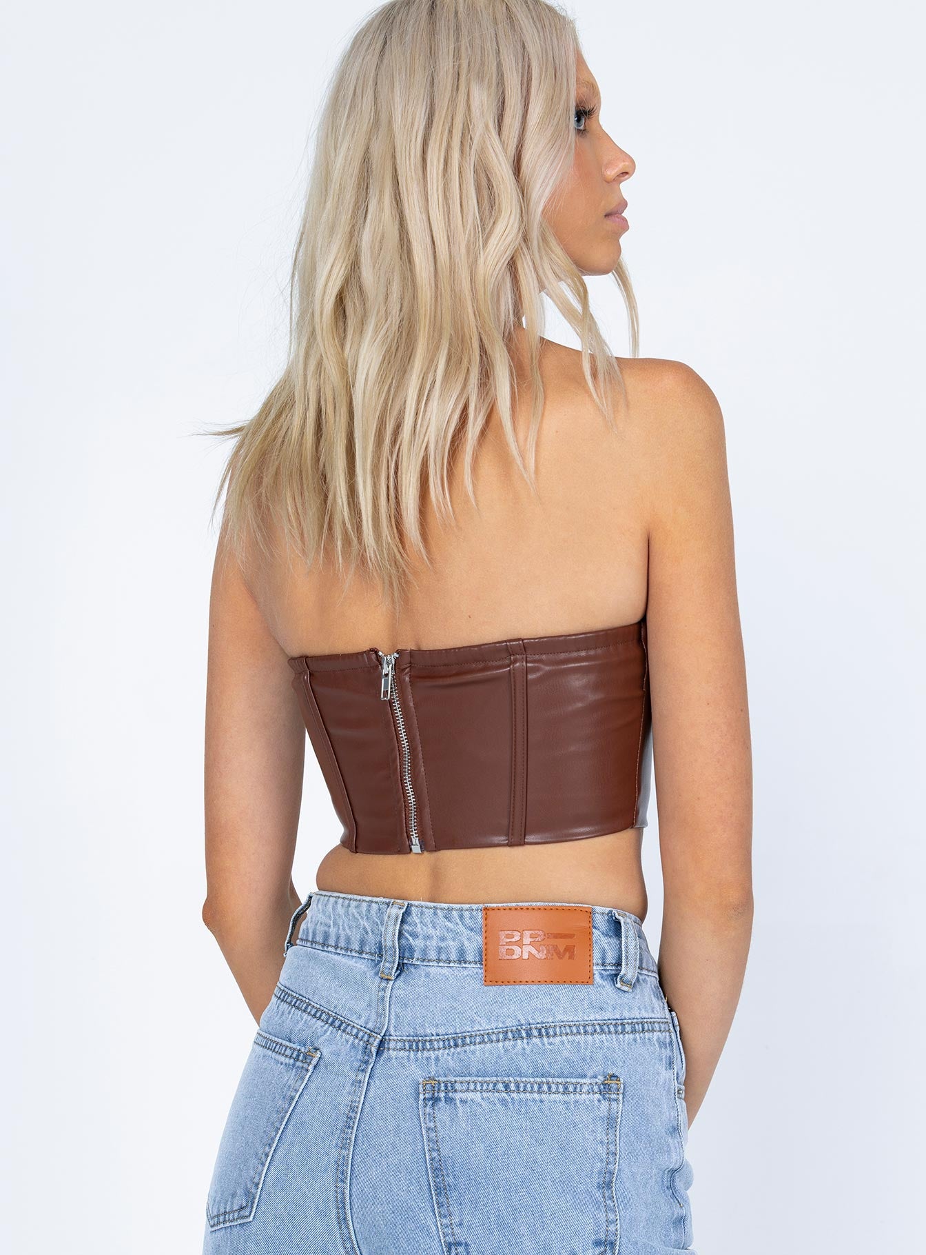 back view of model wearing Princess Polly Johnson Top Brown 