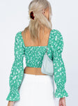 back view of model wearing Princess Polly Rylee Long Sleeve Top Green Floral 