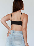 back view of model wearing Princess Polly River Bodysuit Black Sleeveless Plunger 