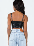 Crop top Faux leather material Adjustable shoulder straps Plunging neckline Invisible zip fastening at side Pointed hem