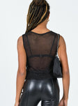 back view of model wearing Princess Polly Almost Famous Top Black 