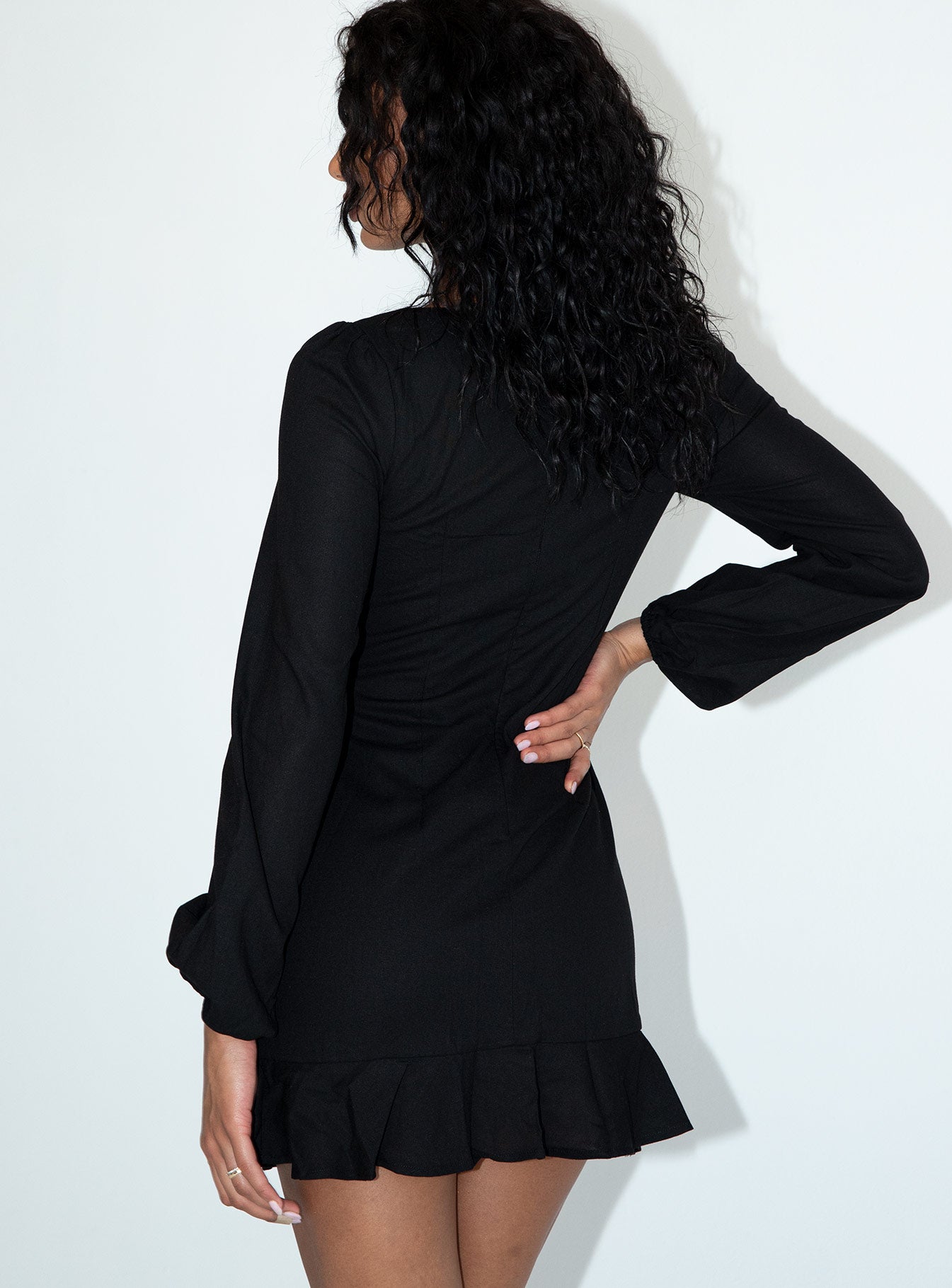 back view of model wearing Princess Polly The Villa Mini Dress Black 