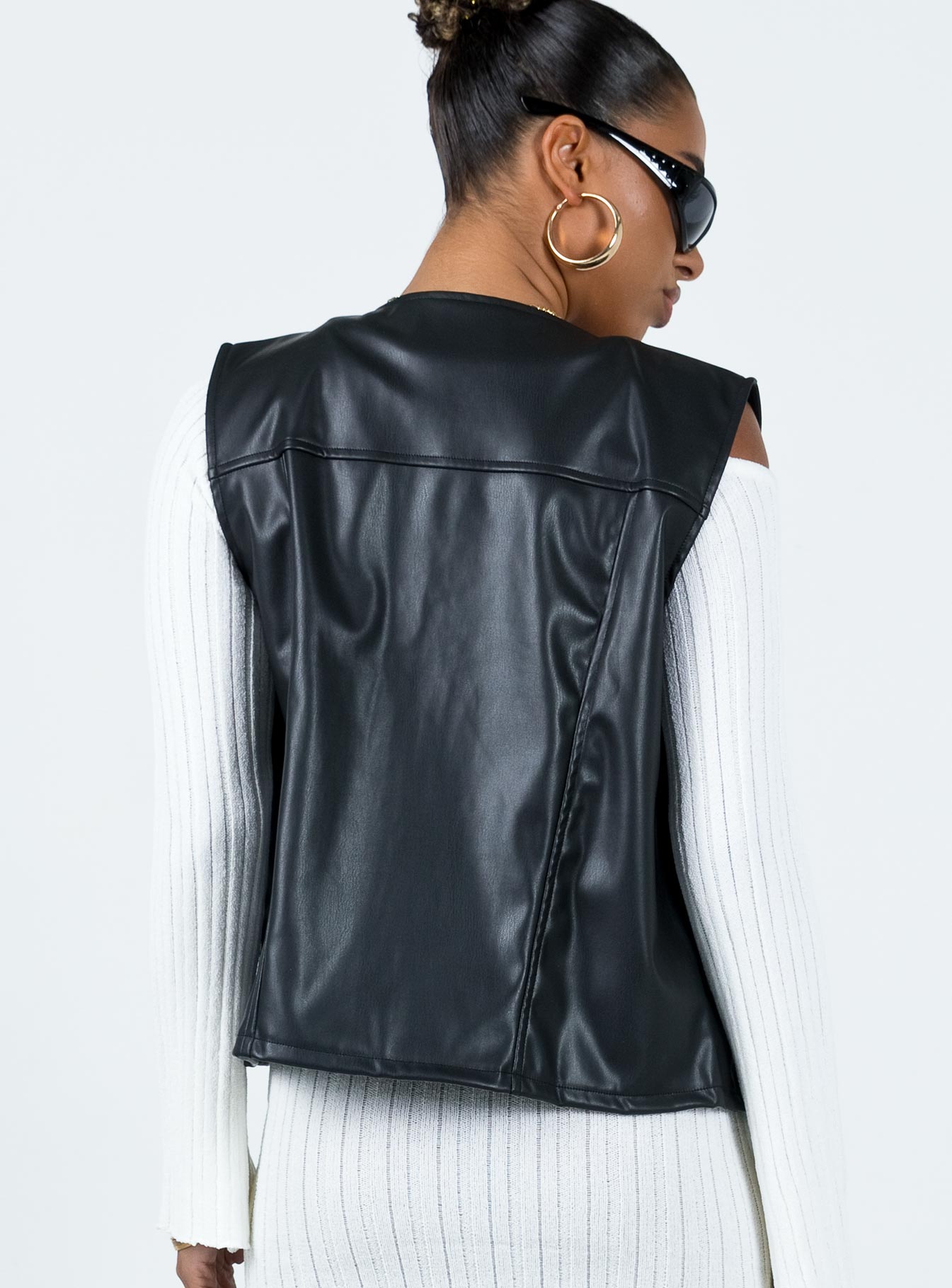 Vest V-neckline Zip fastening at front Twin hip pockets