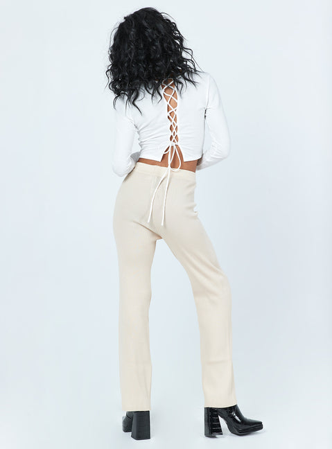 back view of model wearing Princess Polly Jayla Pants Beige 