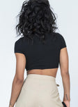 back view of model wearing Princess Polly Brookfield Top Black Short Sleeves Crew Neck 