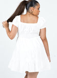 back view of model wearing Princess Polly Daniela Mini Dress White Curve Sweetheart Neckline 