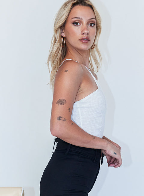 side view of model wearing Princess Polly Morgan Bodysuit White Sleeveless Asymmetric Neckline 