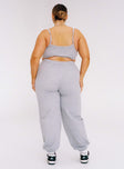 Grey matching set Track style Quilted material Crop top Fixed straps Wide neckline Invisible zip fastening at side High waisted pants Elasticated ankles Relaxed leg Elasticated waistband