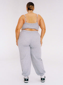 Grey matching set Track style Quilted material Crop top Fixed straps Wide neckline Invisible zip fastening at side High waisted pants Elasticated ankles Relaxed leg Elasticated waistband