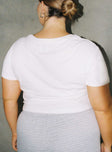 back view of model wearing Princess Polly Organic Take Care Charity Baby Tee White Curve Short Sleeve Crew Neck 