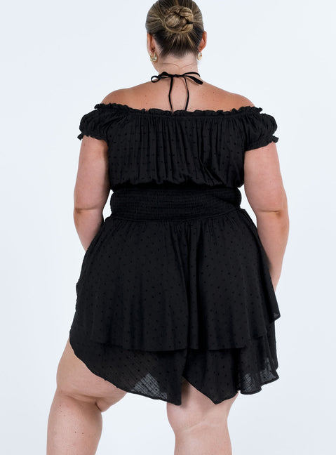 Black romper Can be worn on or off the shoulder Soft textured material Shirred waistband Ruffle detailing