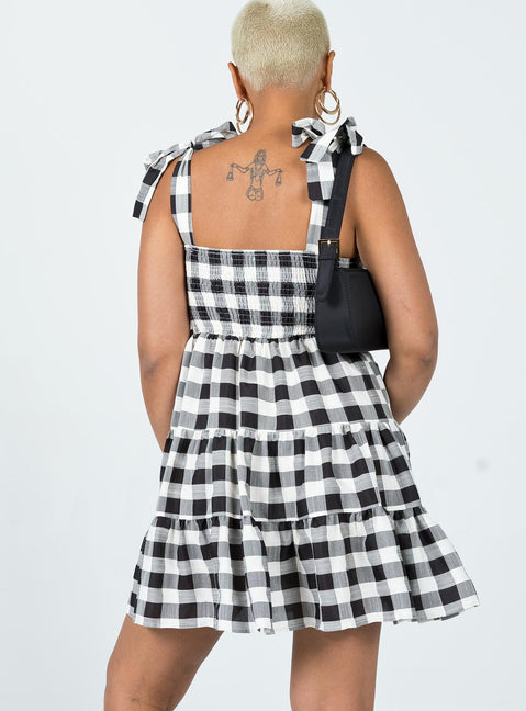 back view of model wearing Princess Polly Rae Mini Dress Black / White 