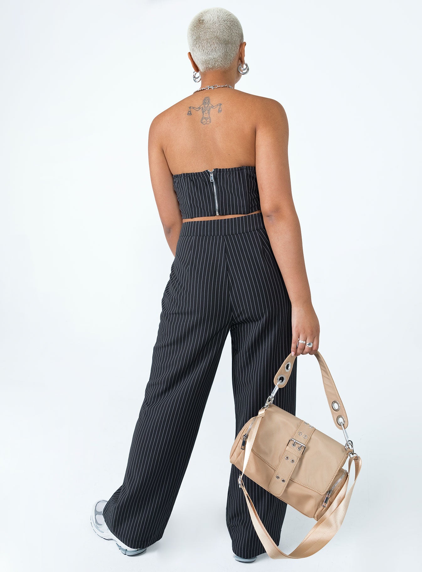 Matching set Pinstripe print  Strapless corset top  Wired cups  Boning throughout  Inner silicone strip at bust  Zip fastening at back  High waisted pants  Zip & button fastening  Wide leg  Non-stretch Lined top 