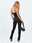 Strapless jumpsuit Inner silicone strip at bust Invisible zip fastening at back Split at cuff Slim leg 