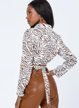 back view of model wearing Princess Polly Philipa Long Sleeve Top Zebra 