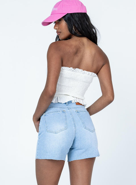 100% cotton shorts Light wash denim  High waisted  Zip & button fastening  Classic five-pocket design  Belt looped waist  Raw-edge hem  Princess Polly badge on back 