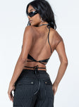 Crop top Faux leather material  Halter neck tie fastening  Wast wrap tie  Non-stretch Fully lined 