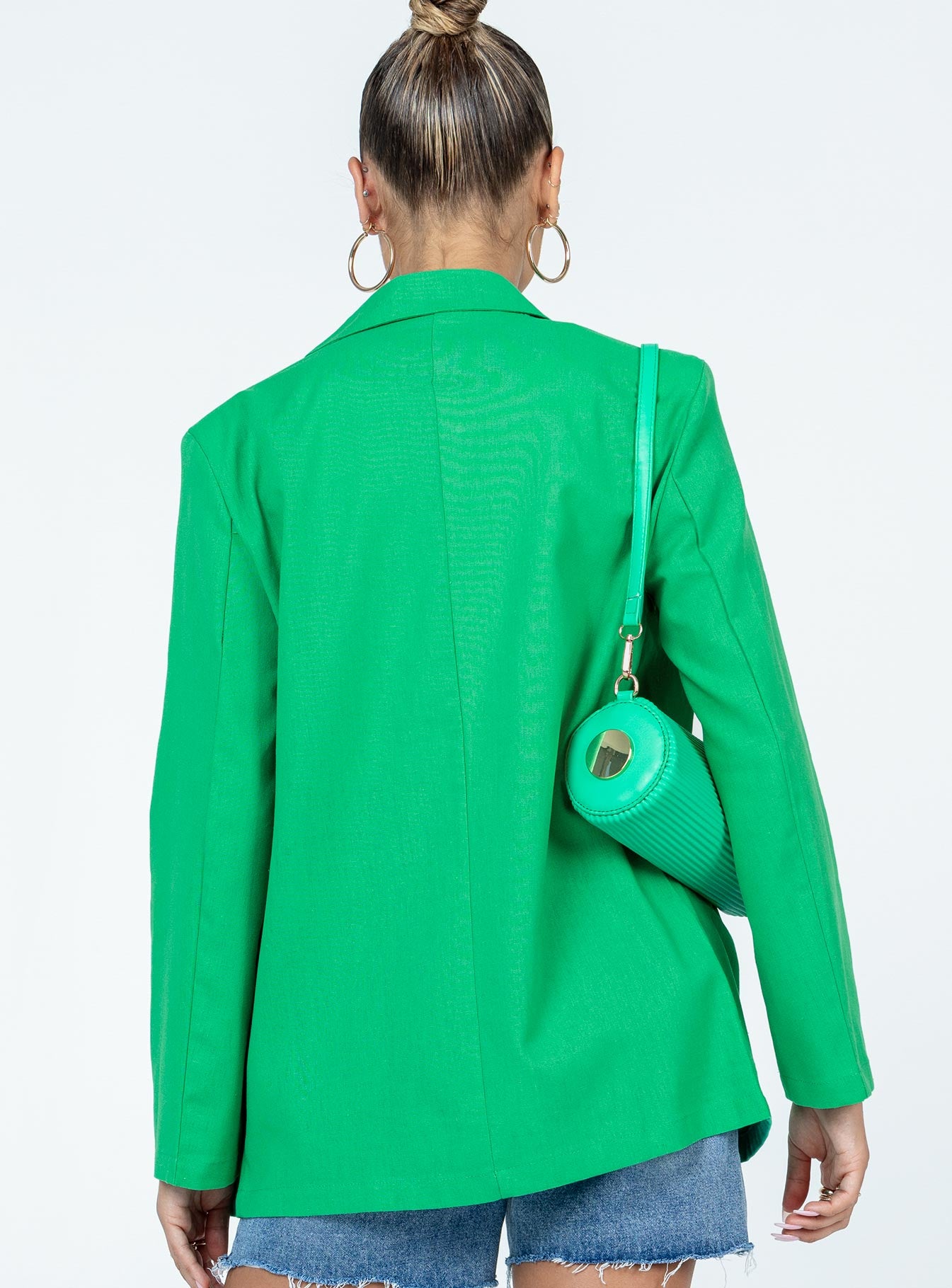 Green blazer Lapel collar Button front fastening Twin hip pockets Faux chest pocket Padded shoulders