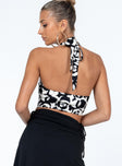 Front view of model wearing  front Princess Polly Sleeveless Asymmetric Neckline  Benicia Top Black / White