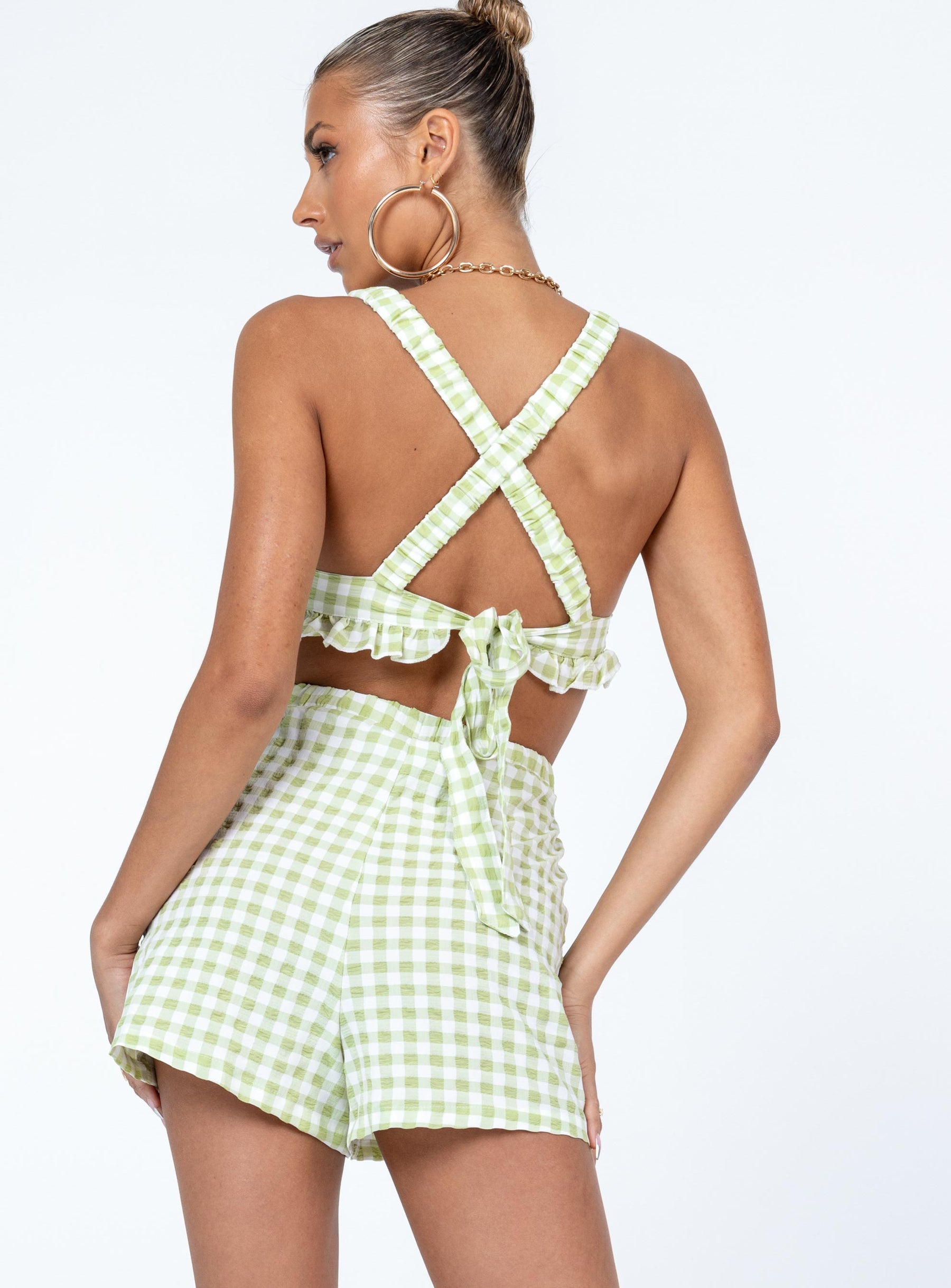 Matching set Check print  Crop top Elasticised straps  Frill hem  Back tie fastening High waisted shorts  Elasticated waistband 