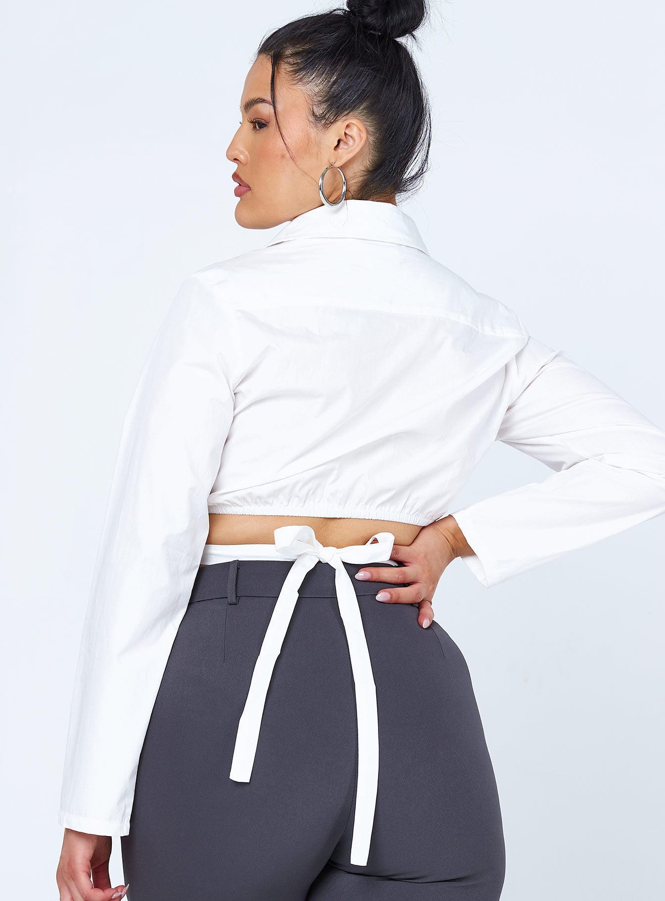 back view of model wearing Princess Polly Philipa Long Sleeve Top White 