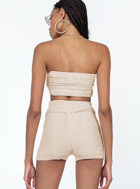 Matching set Soft knit material  Strapless crop top  Ring detail at bust  High waisted shorts  Elasticated waistband  Fitted at leg 