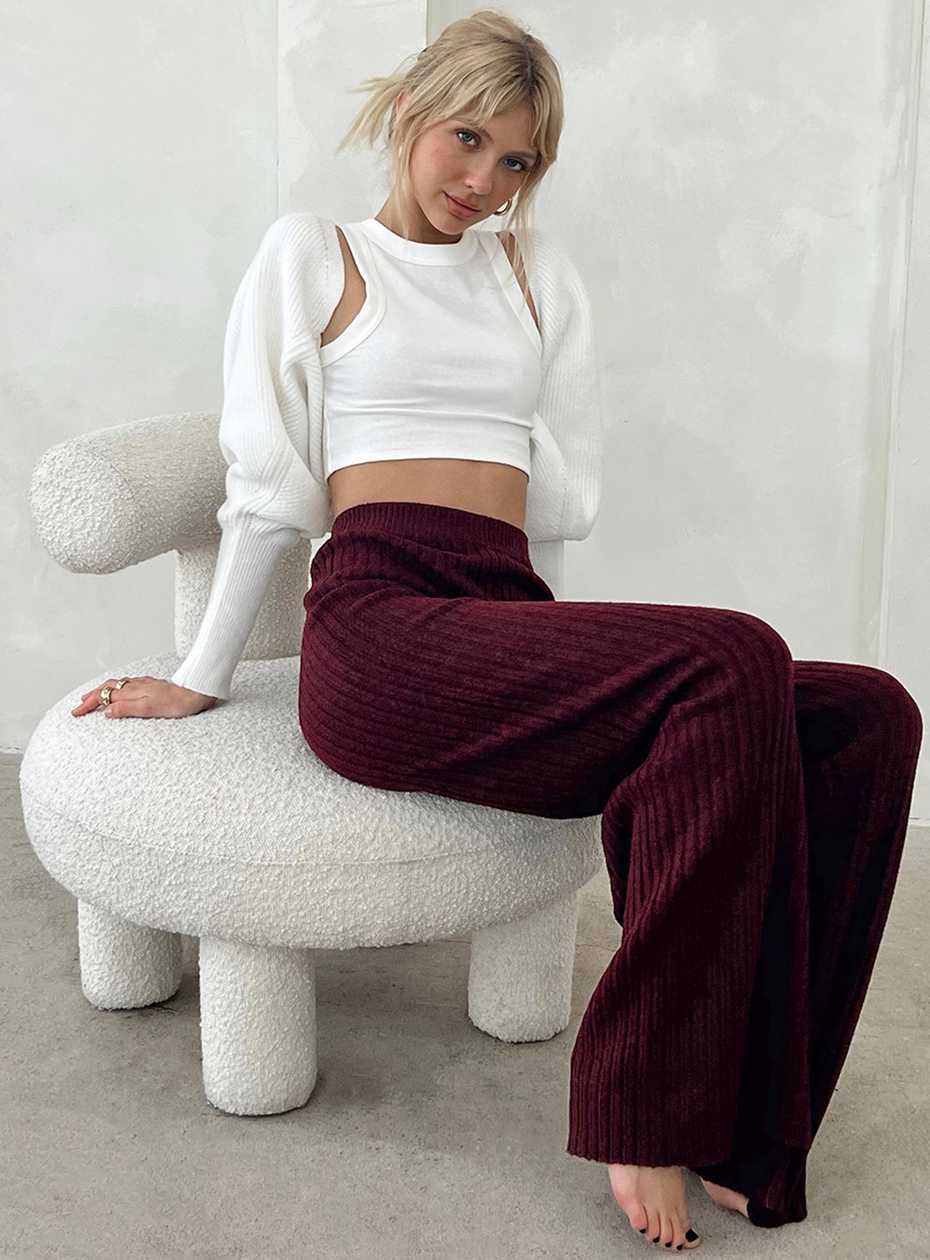 Front view of model wearing  front Princess Polly High Waisted Pants High Waisted Pants High Waisted Pants High Waisted Pants  Montana Knit Pants Maroon